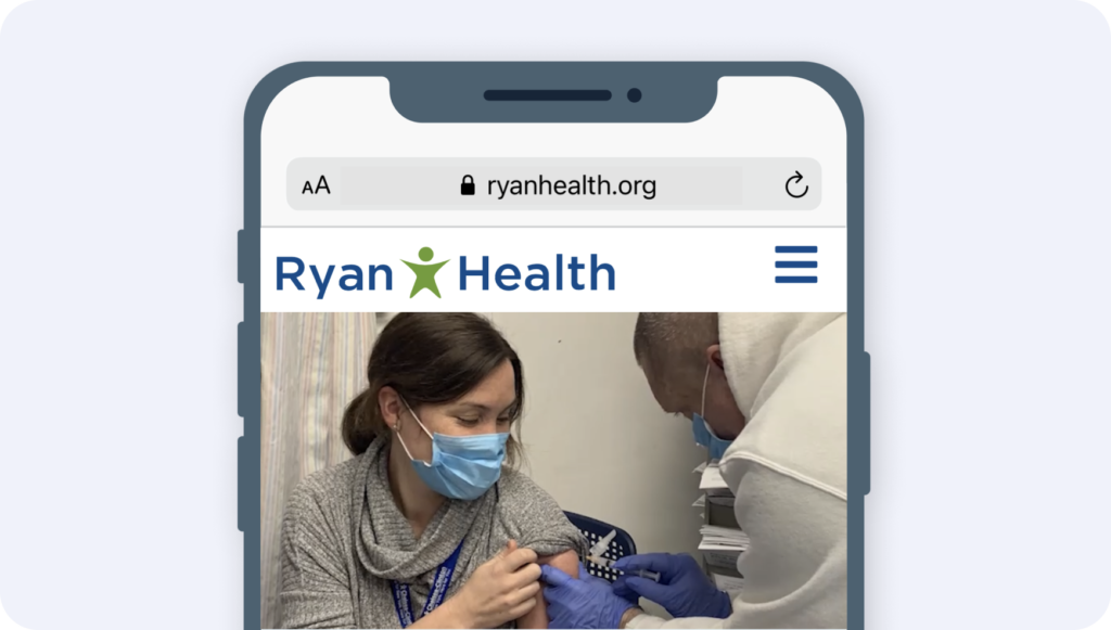 woman wearing a mask receiving a vaccine from a man wearing a mask